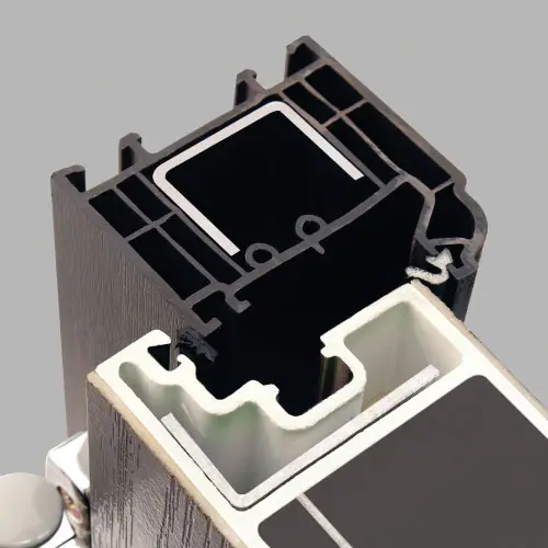 A cross-sectional view of a door construction showing an intricate interior frame made of black and white materials, highlighting the layered design and structural integrity.
